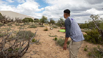 SJC Student playing on campus SJC Disc Golf