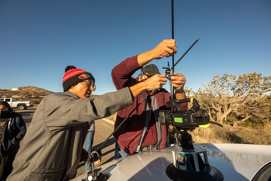 San Juan College students in the DMAD Program mounting a camera to a vehicle